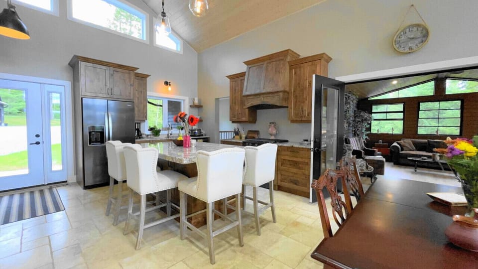 Kitchen & screened room to the right