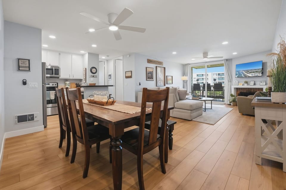 Gather around the dining table for relaxed meals after a day at the beach
