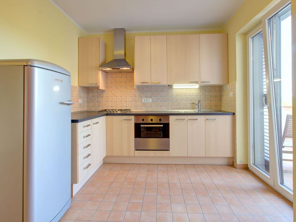 Countertop, Cabinetry, Property, Furniture, Building, Kitchen Appliance, Kitchen Stove, Home Appliance, Kitchen, Wood