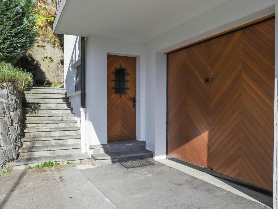 Plant, Property, Building, Wood, Door, Road Surface, Facade, Composite Material, Home Door