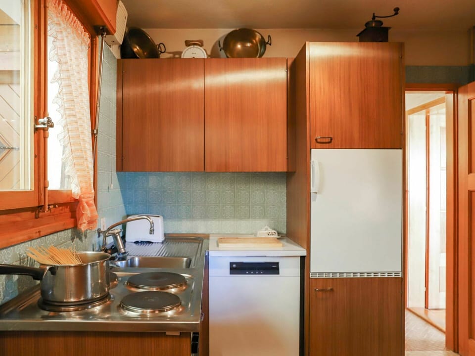 Property, Cabinetry, Countertop, Gas Stove, Cooktop, Wood, Lighting, Kitchen, Kitchen Appliance, Interior Design