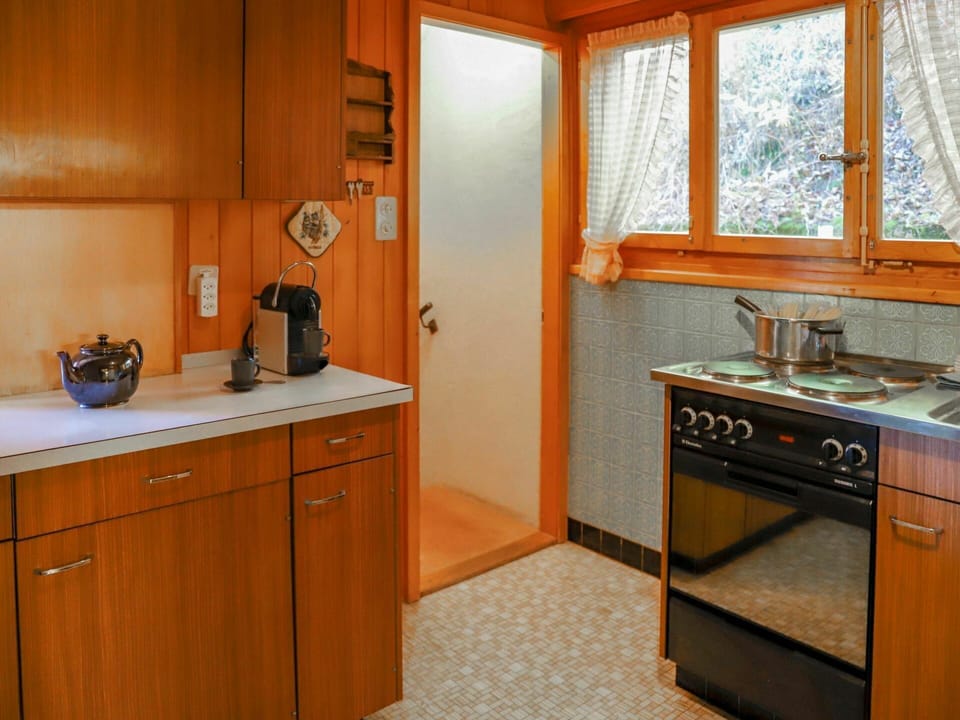 Cabinetry, Property, Countertop, Window, Building, Kitchen, Wood, Interior Design, Lighting, Drawer