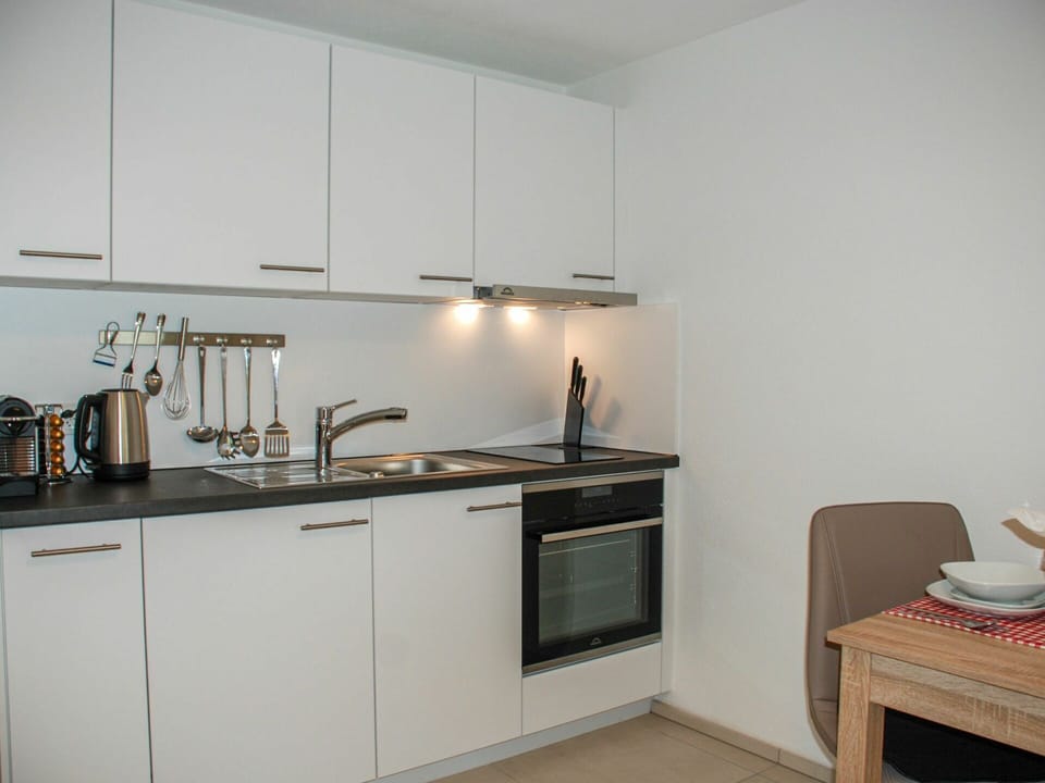 Cabinetry, Countertop, Sink, Kitchen Stove, Kitchen Sink, Kitchen Appliance, Home Appliance, Stove, Kitchen, Tap