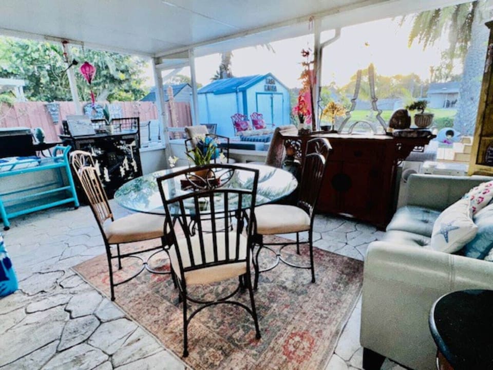 Hello friends welcome to the laundry room with an amazing twist! Enjoy doing laundry and a beautiful covered outdoor space surrounded by nature perfect for a peaceful brunch or lunch as well. This is a relaxing, productive escape. Don't let chores ge