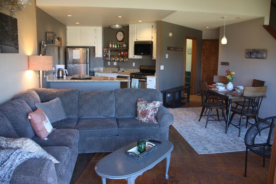 Open concept kitchen, dining room, and living room