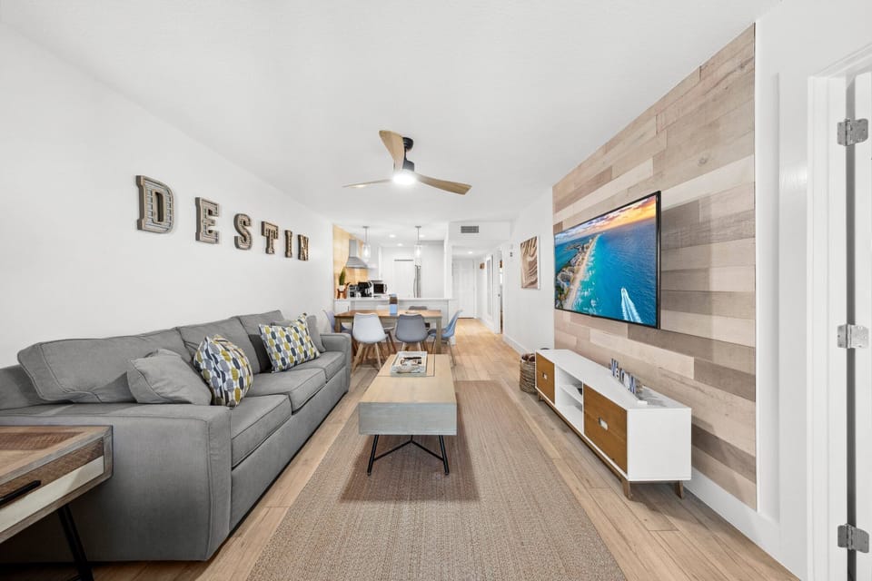 Very clean updated gorgeous living room at our Tradewinds condo in Miramar beach Florida.  