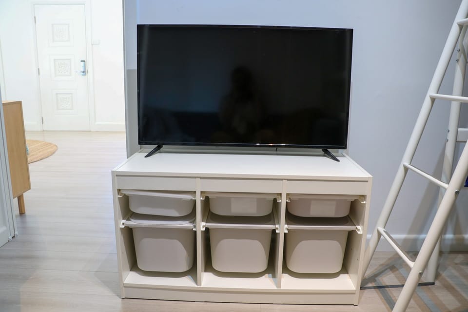 Storage bins under the TV in the Bunk Room are great for toys or clothes!