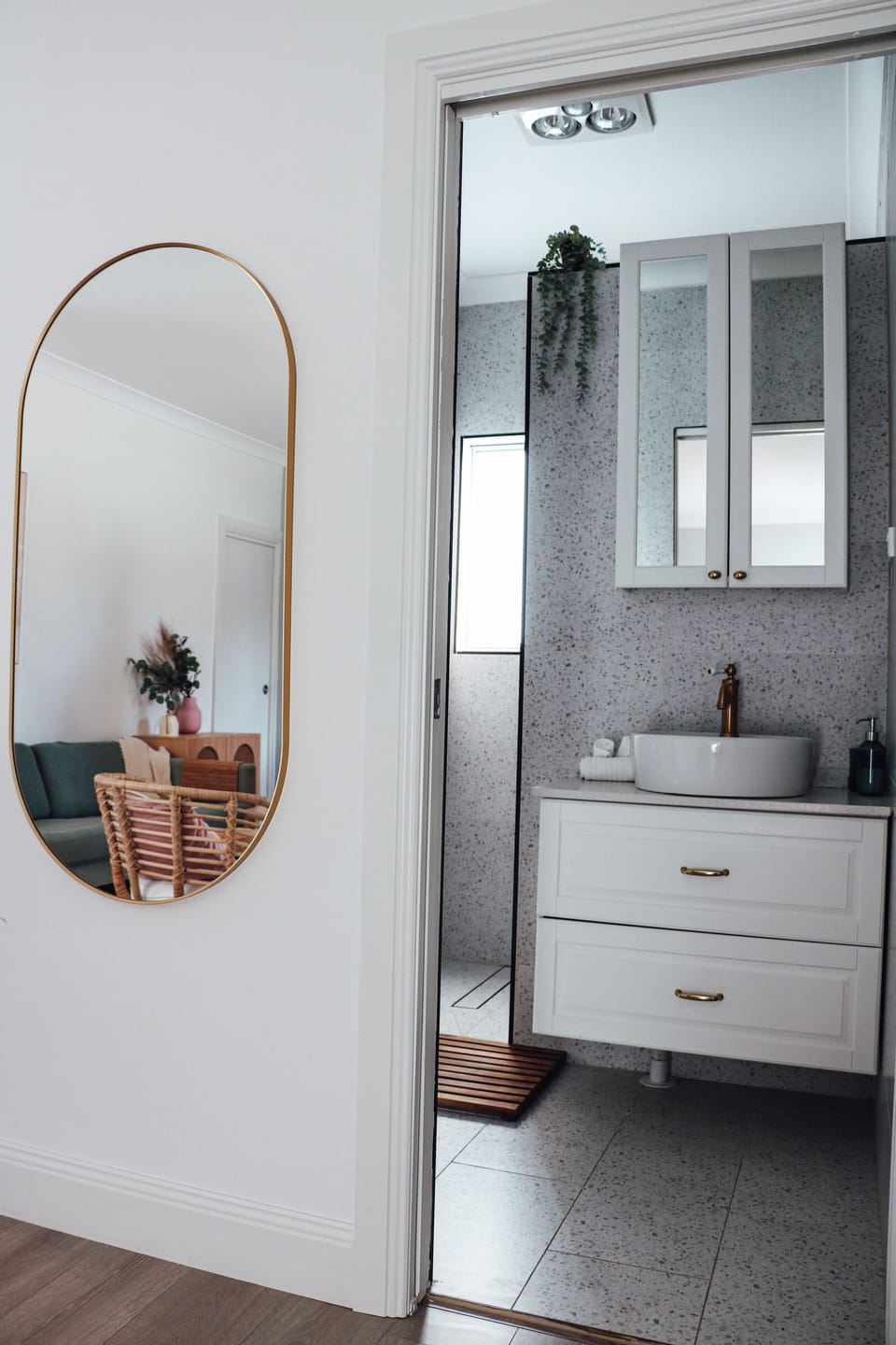 The main bathroom entices with its modern fixtures.