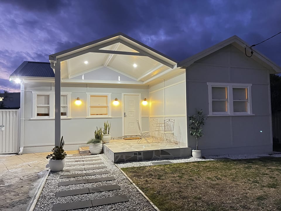 Unwind with a hot or cold beverage in the seating area on the front deck.