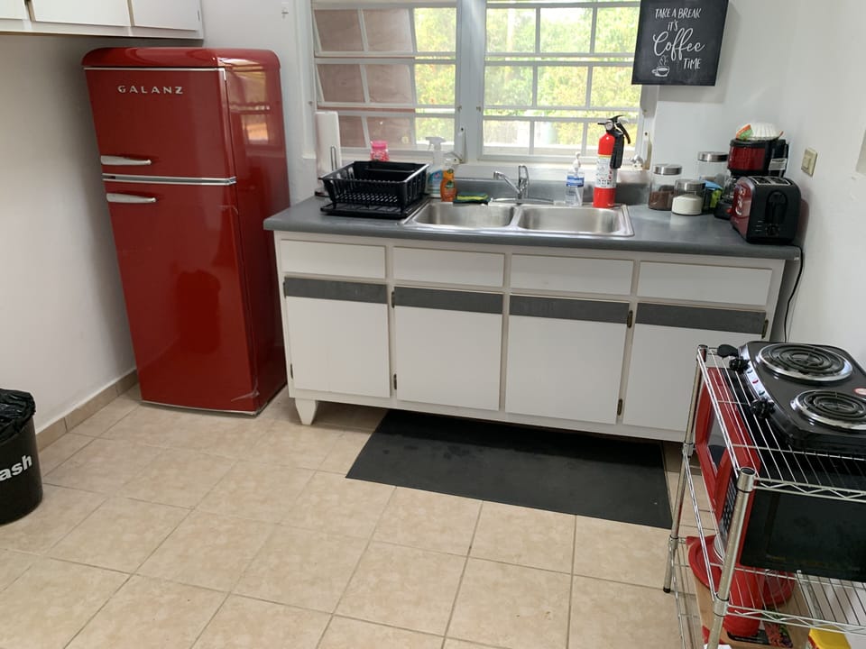 Kitchenette with coffee station.