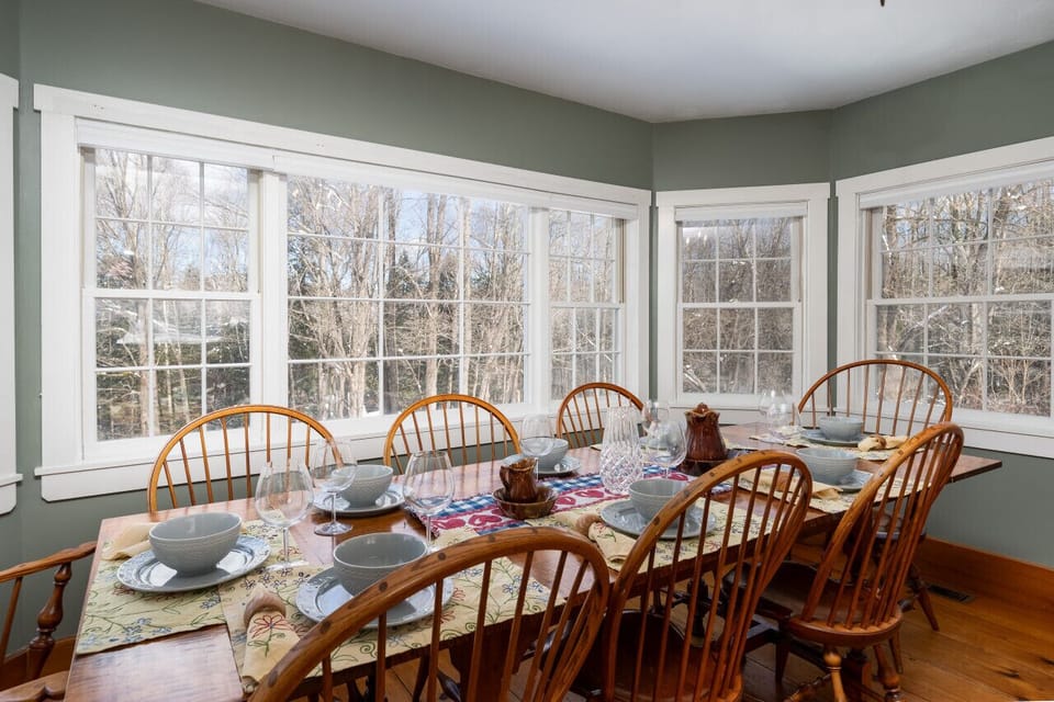 Create memories over meals in our Vermont retreat`s dining area.