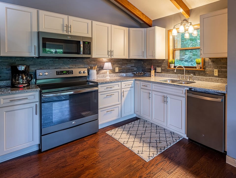 Mountain Oasis Cabin Rental - Living Room with Fully Equipped Kitchen