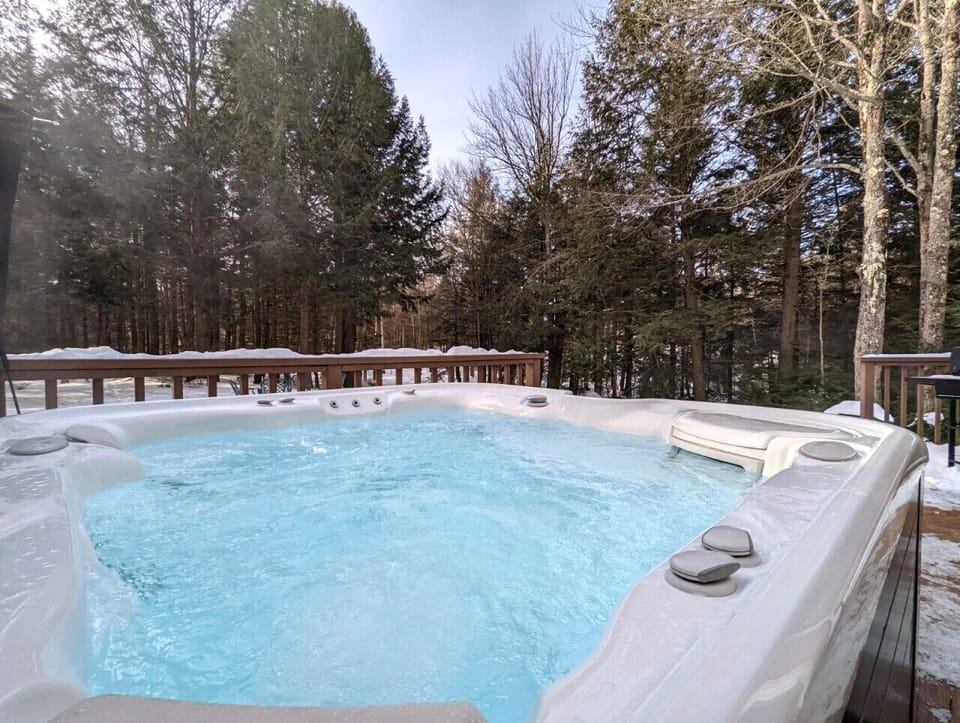 Unwind in the warm, bubbling water of the hot tub, the perfect way to soothe your muscles and de-stress after a long day.