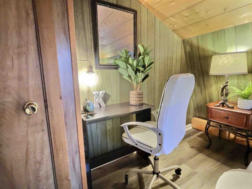 Get productive in our workspace with a desk and comfy chairs.