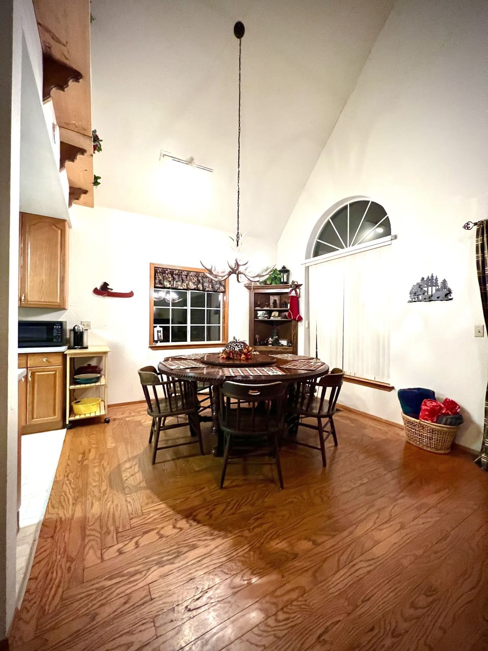 Dining Area w/ Large round Table seats 8