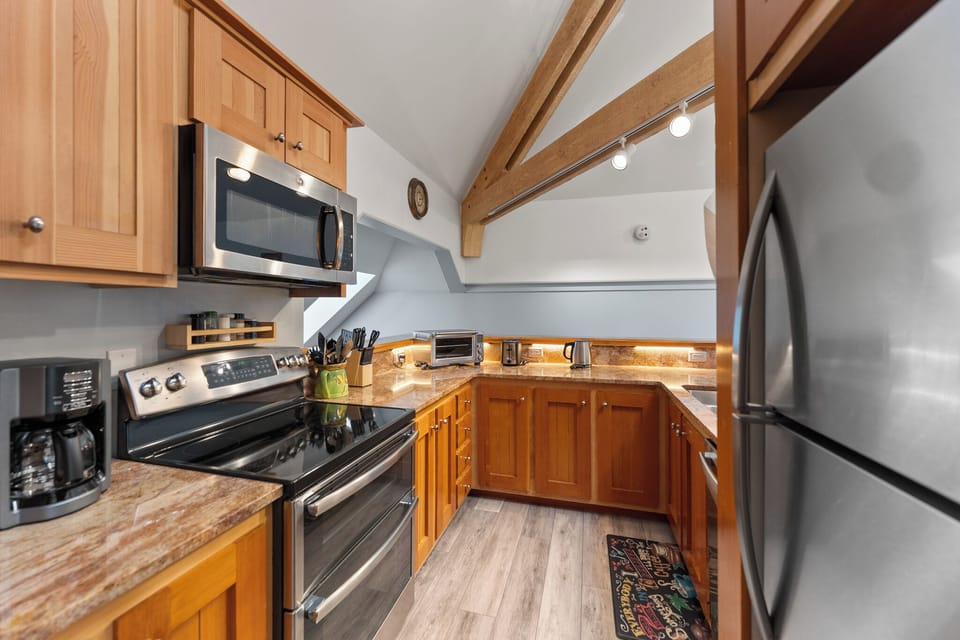 Full size kitchen with stainless steel appliances and lots of counter space