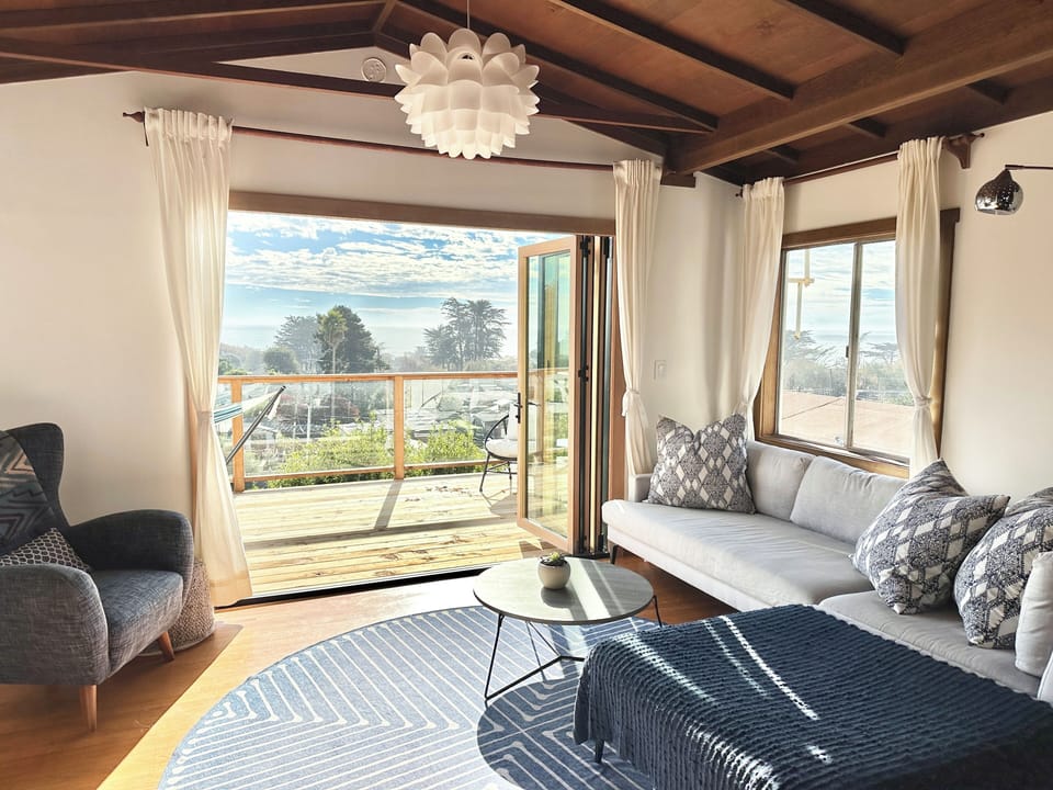 Living Room La Cantina door opening onto the redwood deck 