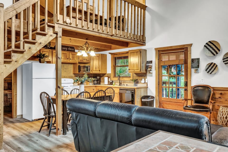Living Room & Kitchen along with stairs to upper level