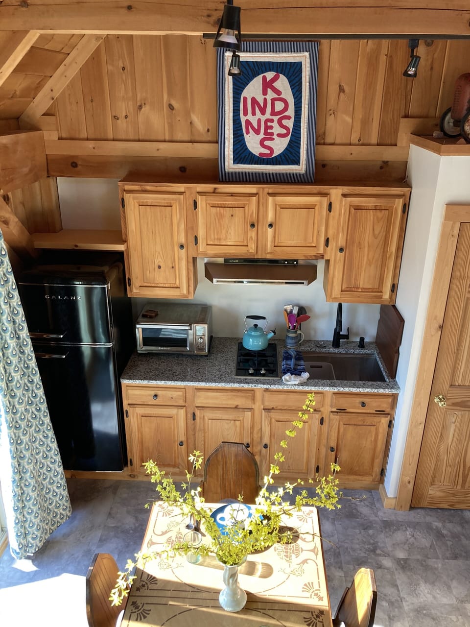 View of dining and kitchen from the loft