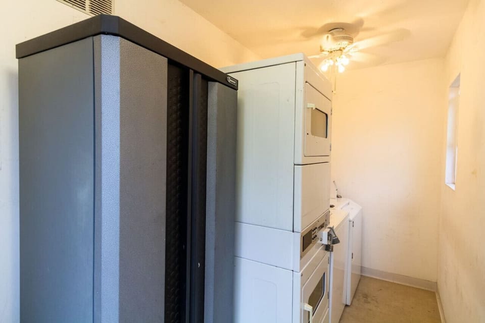 Shared laundry with 2x washers 2x dryers.Coin-operated $1.50 each load. Shared by all 4 units.