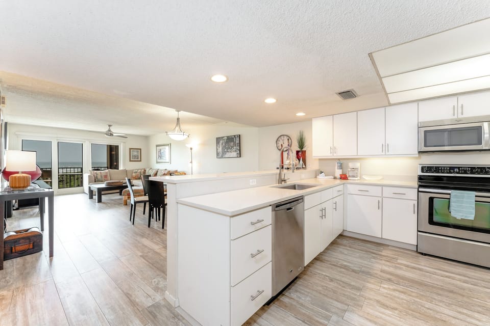 Enjoy the ultimate night in with plenty of room for activities in your beach front condo living room. Relax, unwind, and experience the ultimate home comfort! #cozyathome