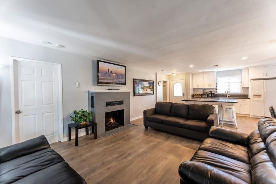 Living room with TV and sofa couch. Open concept.