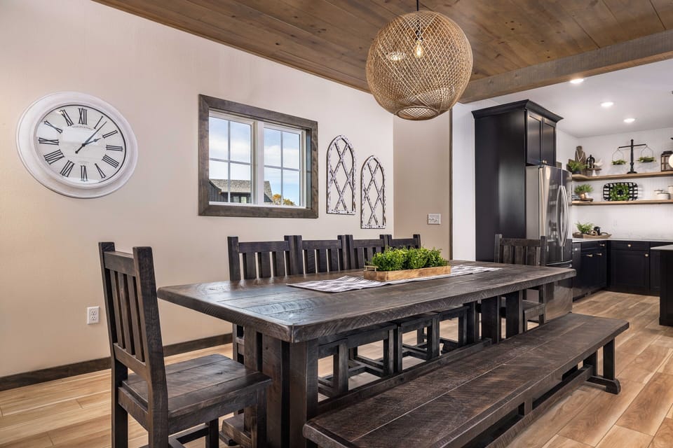 Beautiful dining table open to the kitchen and living room