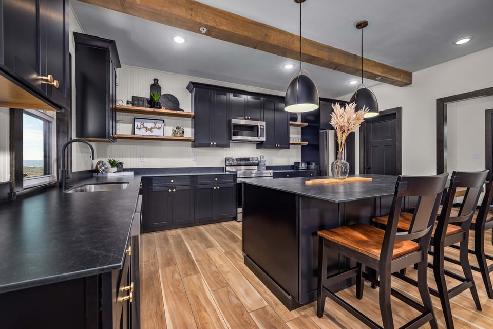 Gourmet kitchen with stainless appliances.