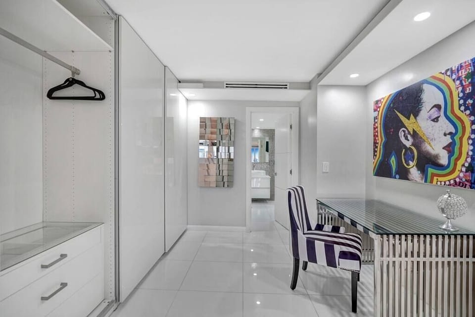 Master bedroom suite, office area across from closet, private bathroom