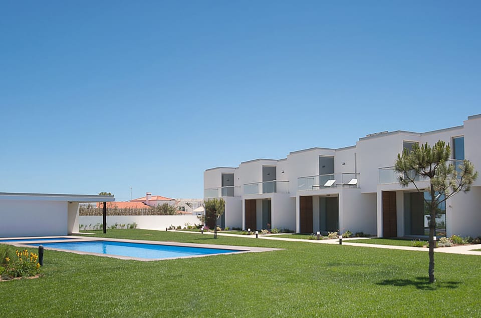 Semi-detached house with access to the pool. 