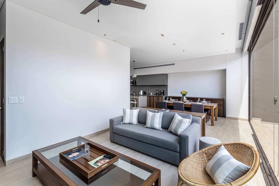 Elegance meets comfort in this La Marina condo's stylish living room.