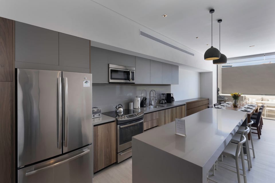 Modern elegance meets culinary convenience in the kitchen of this La Marina sanctuary.