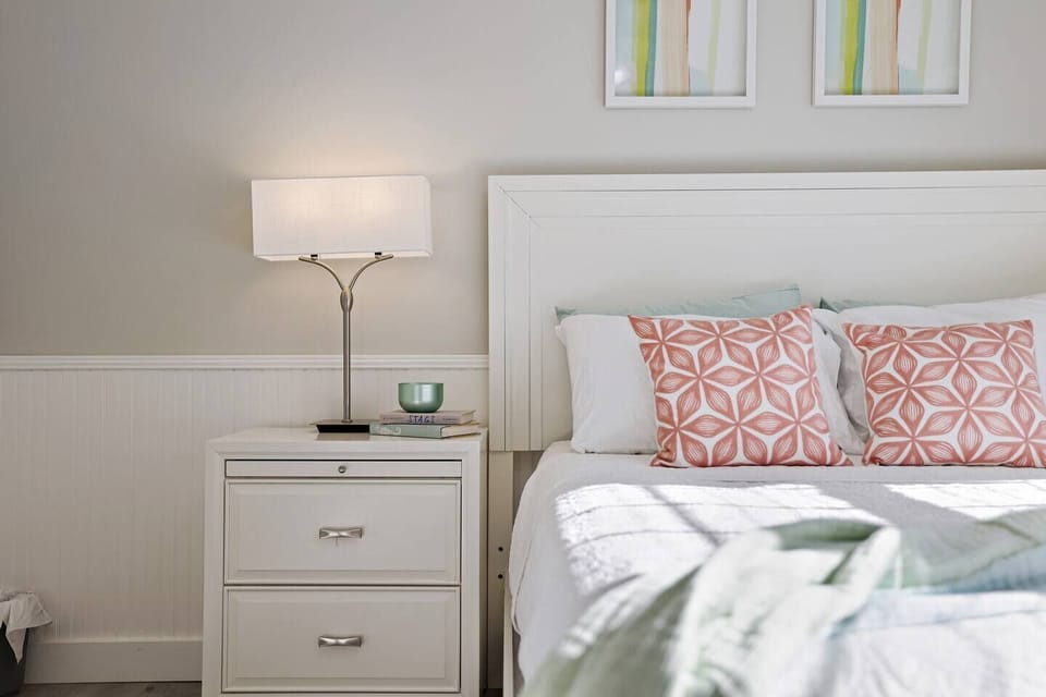 Guest bedroom #4 with queen bed and bright decor