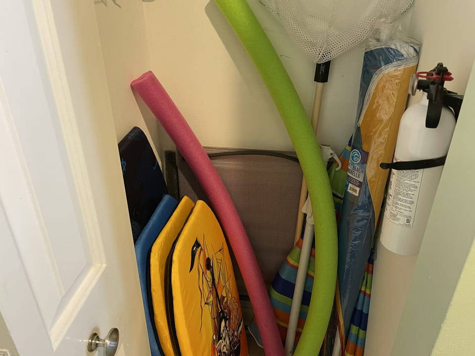 Beach and table umbrellas, 2-3 beach chairs, water toys, etc.