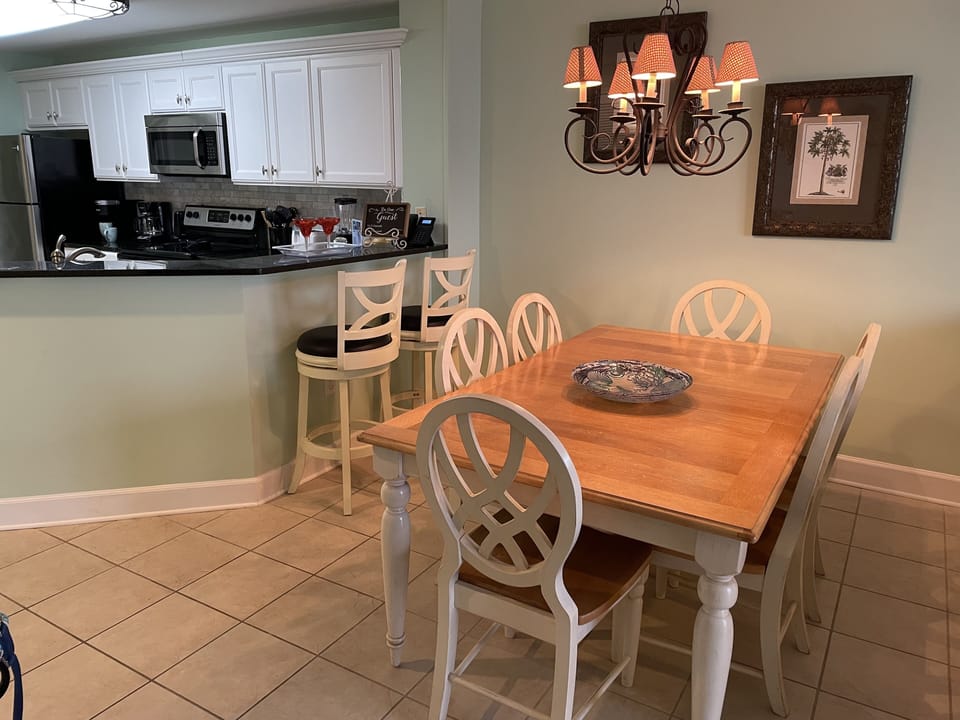 Dining area view into kitchen.