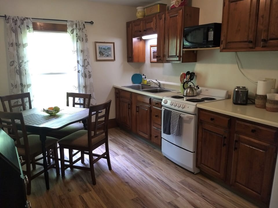 Spacious & well-equipped kitchen: pots & pans, utensils, basic spices, oils.