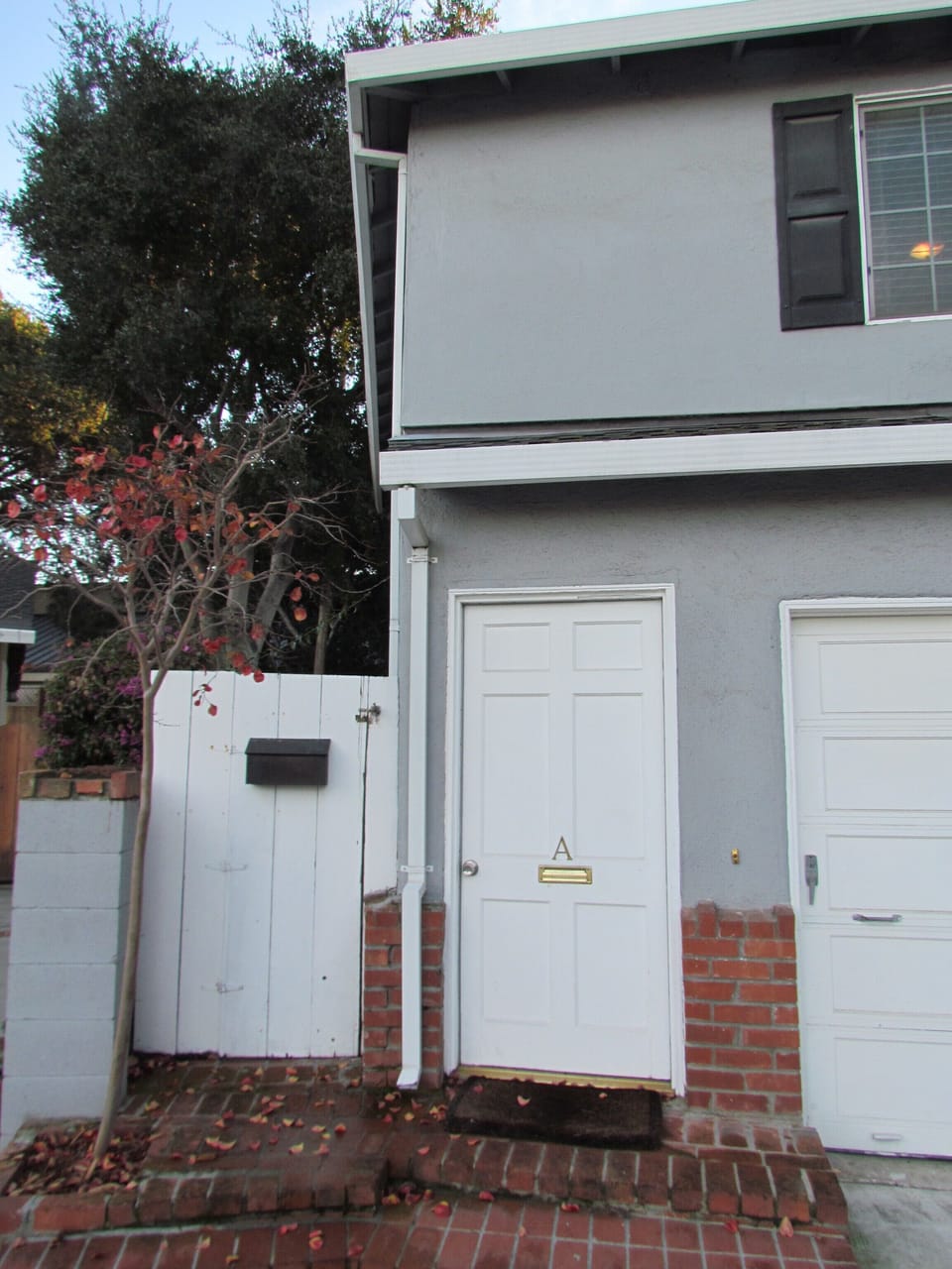 Private Entrance to 1Br/1Ba unit is to left of garage