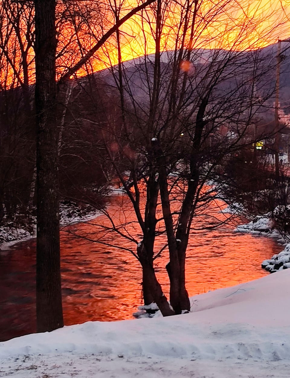 Sunrise in winter. Side yard looking east, Androscoggin River.