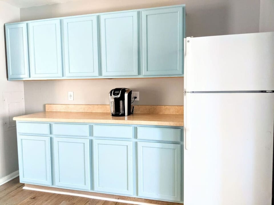 The kitchen is equipped with a full set of pots & pans, and other necessities.