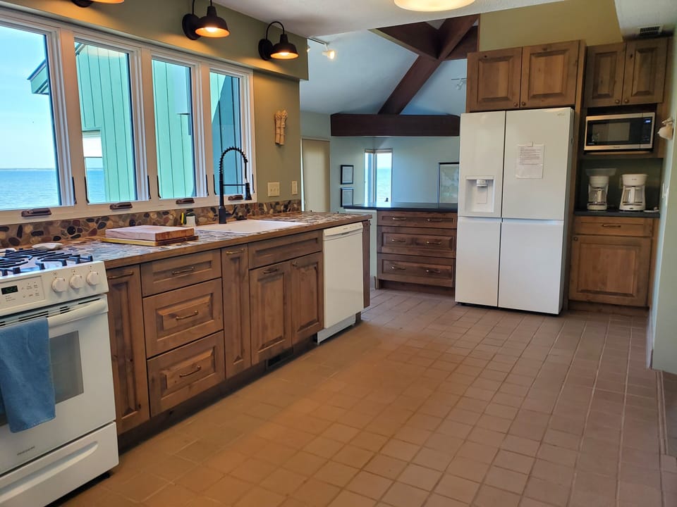 New appliances, sink, floor and cupboards.