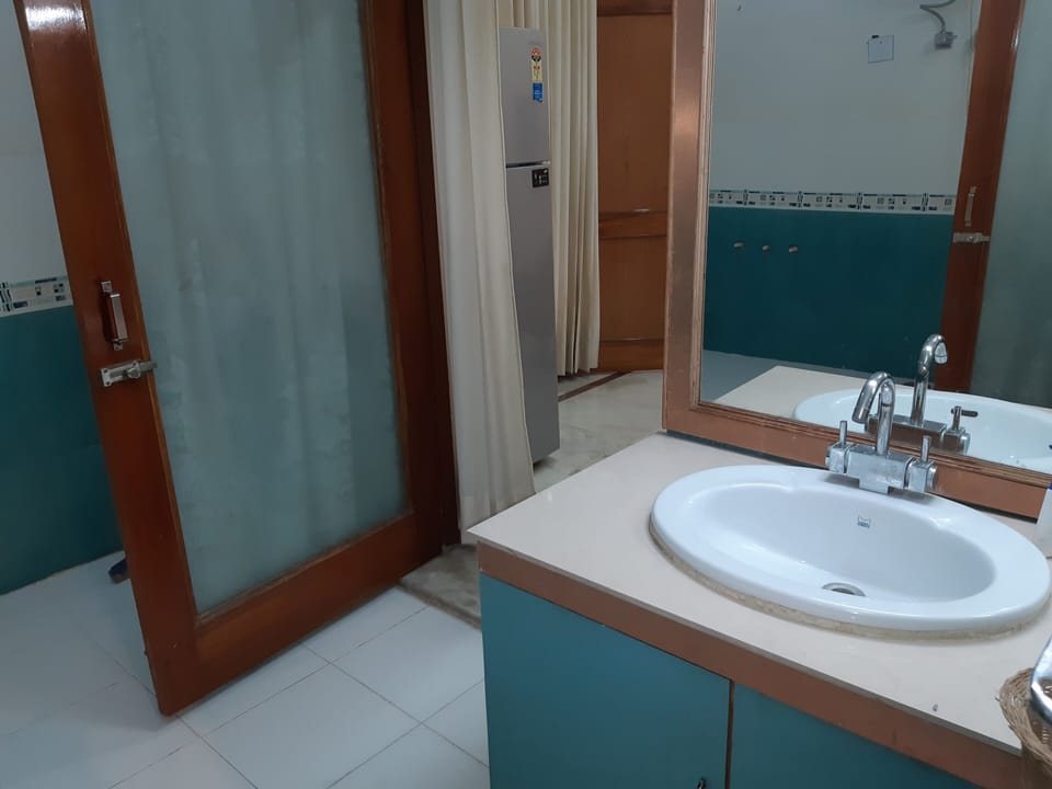 Bathroom 1 of 2BHK Executive Suite SA5. Also, it is part of Apartment SA3.