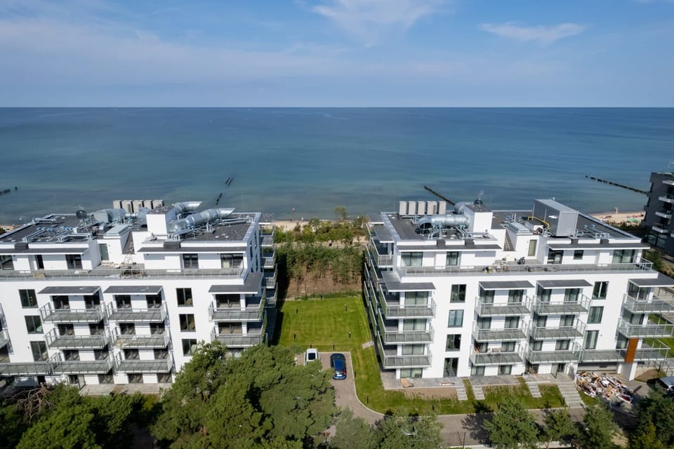 A bird's-eye view of the luxury flat blocks that are located close to the sea.