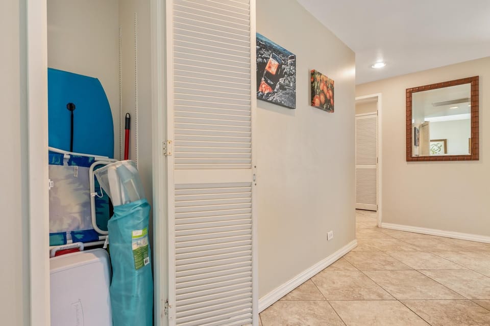 In the entry way~ there is a closet with plenty of beach gear