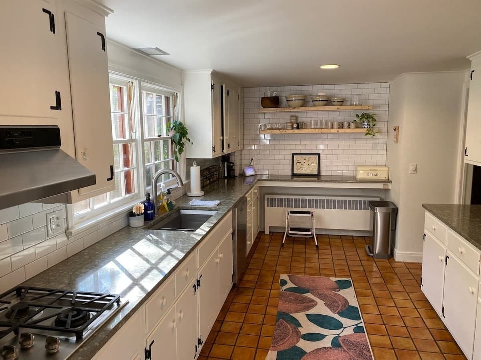 Sunny kitchen with lots of counter space, everything you need to prepare meals…