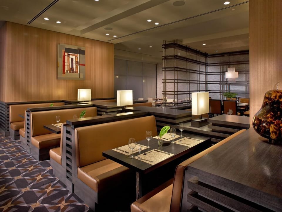 Settle into cozy booths for an intimate dinner experience