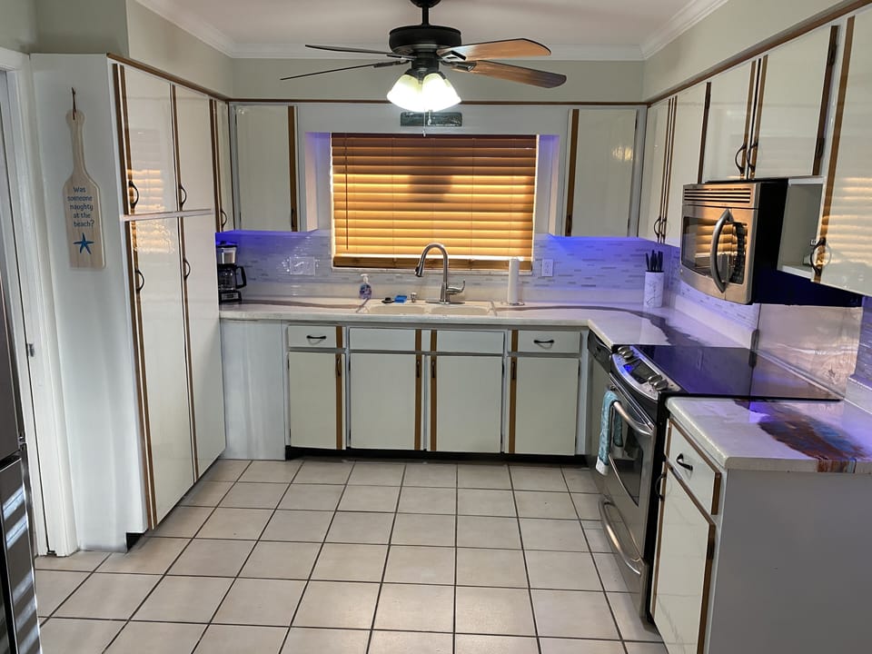 Fully stocked kitchen with all the needed appliances and utensils. 
