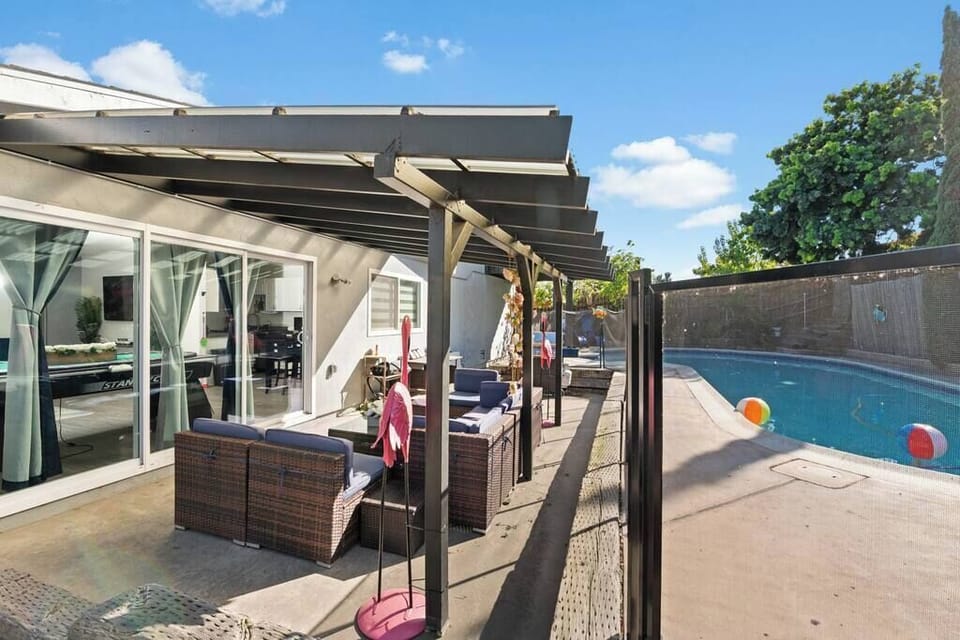Flamingo lounge with outdoor seating under a covered patio.