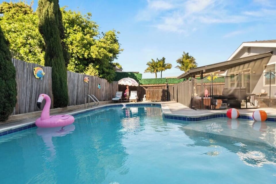 Giant pool with safety gate, seating, solar heat, gas heat for $100/day.