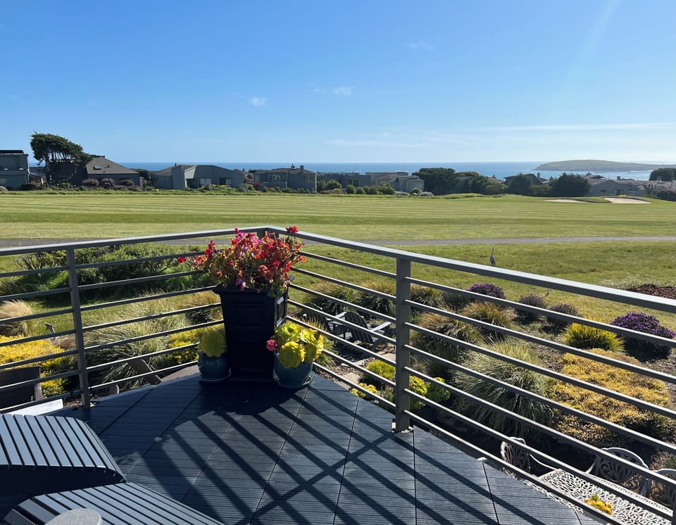 View from primary bedroom balcony of 14th fairway, Bodega Head and open seas.