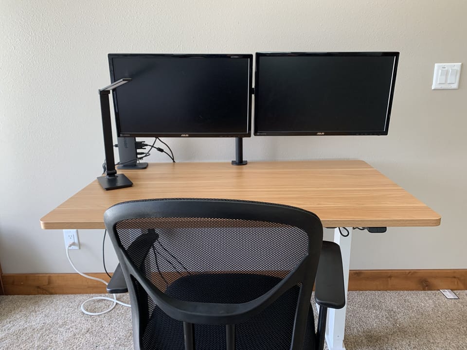 Adjustable table, high speed internet making working remotely easy.